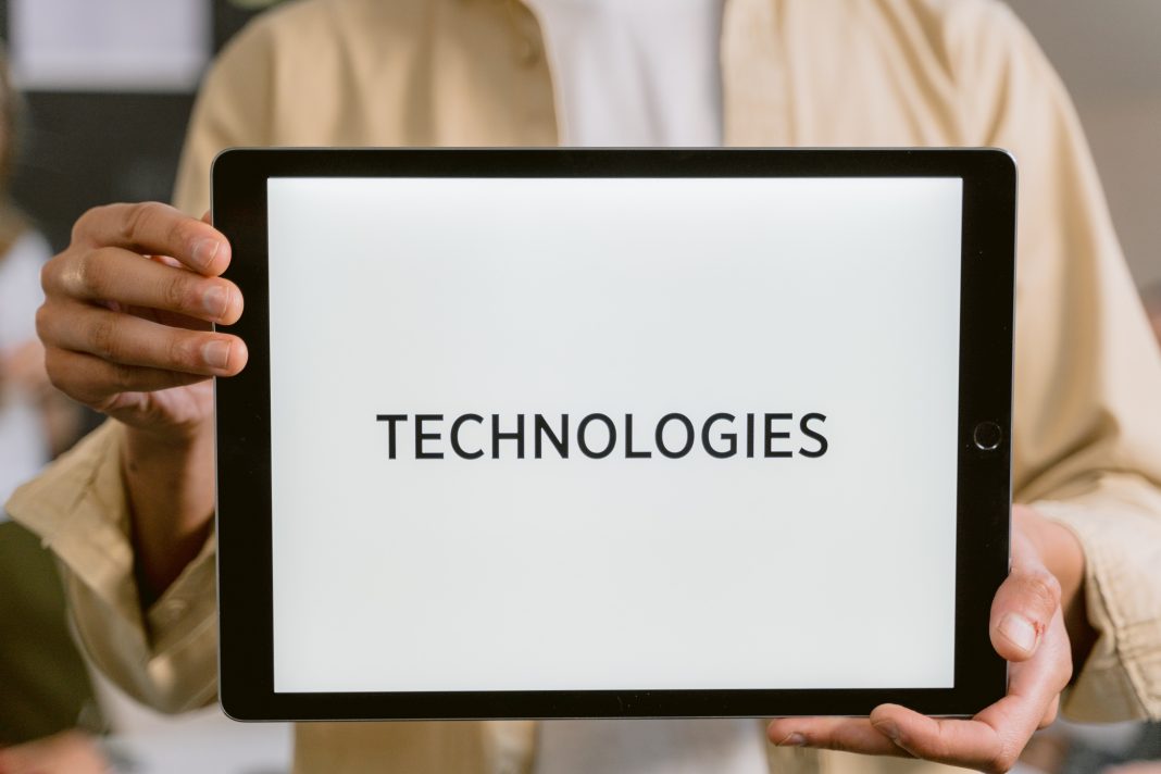 The word Technologies on a tablet screen